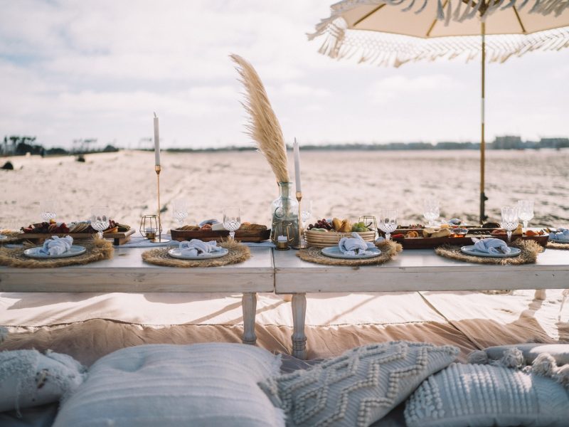 Bohemian style beach themed picnic wedding event